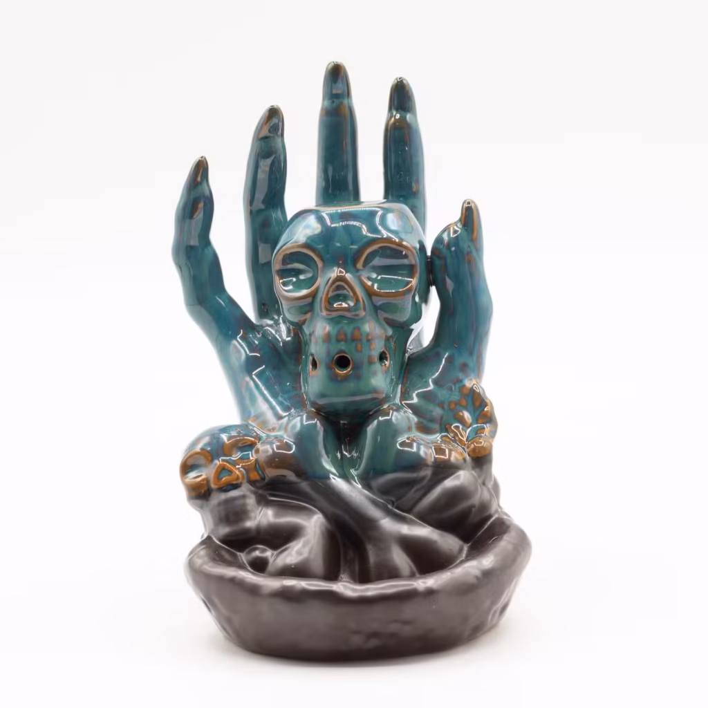 Quemador de incienso Reflujo - Calavera en la mano